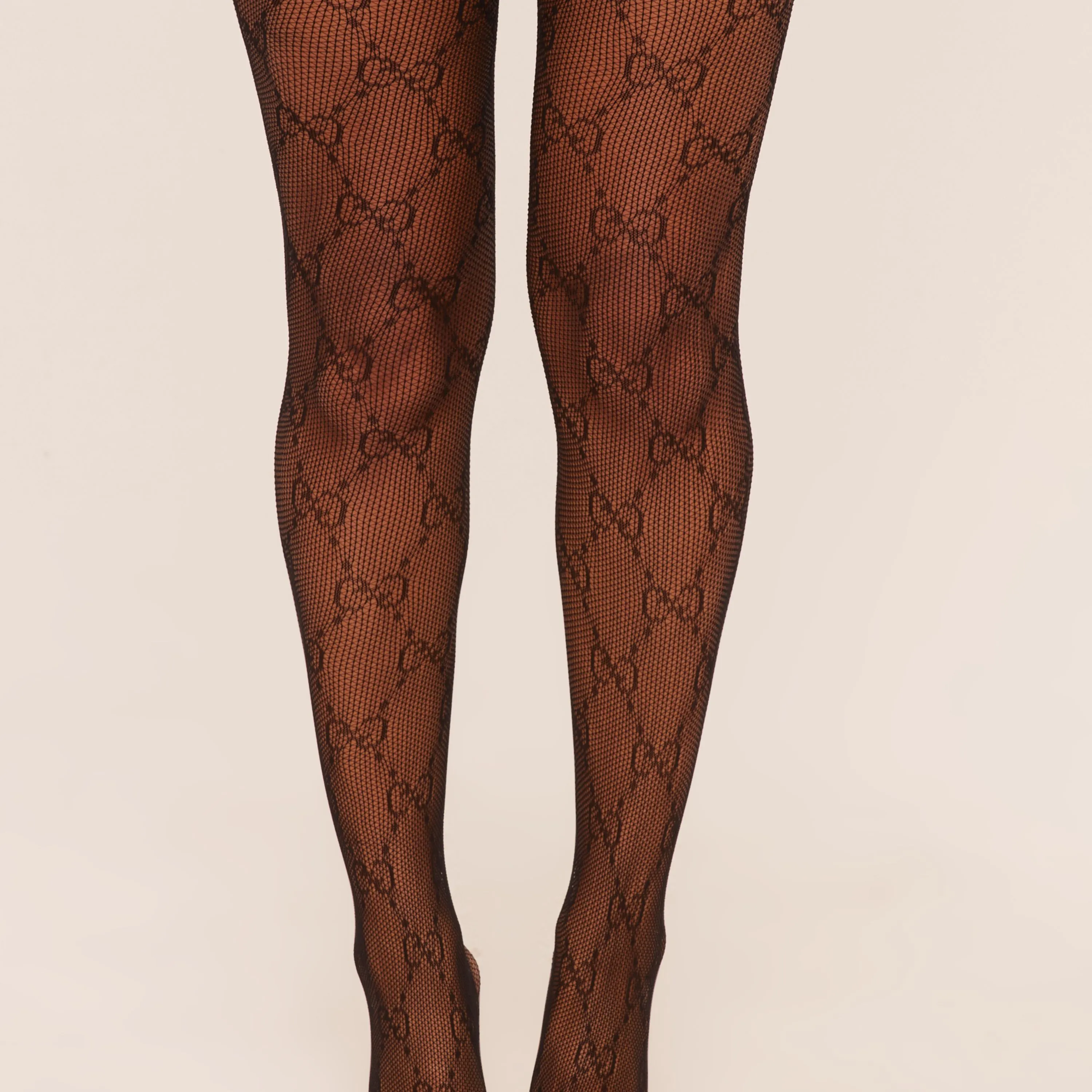 Logo Detail Fishnet Tights In Black