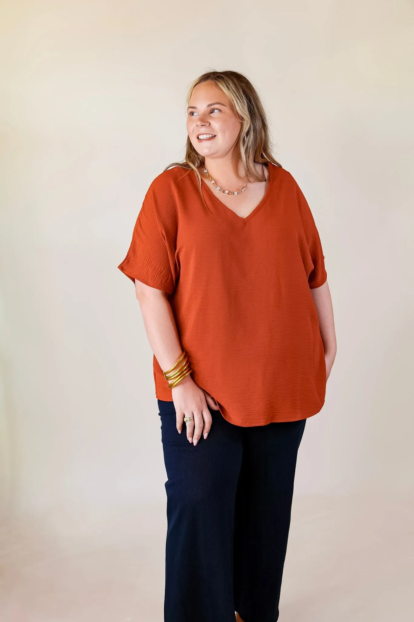 Lovely Dear V Neck Short Sleeve Solid Top in Rust Orange