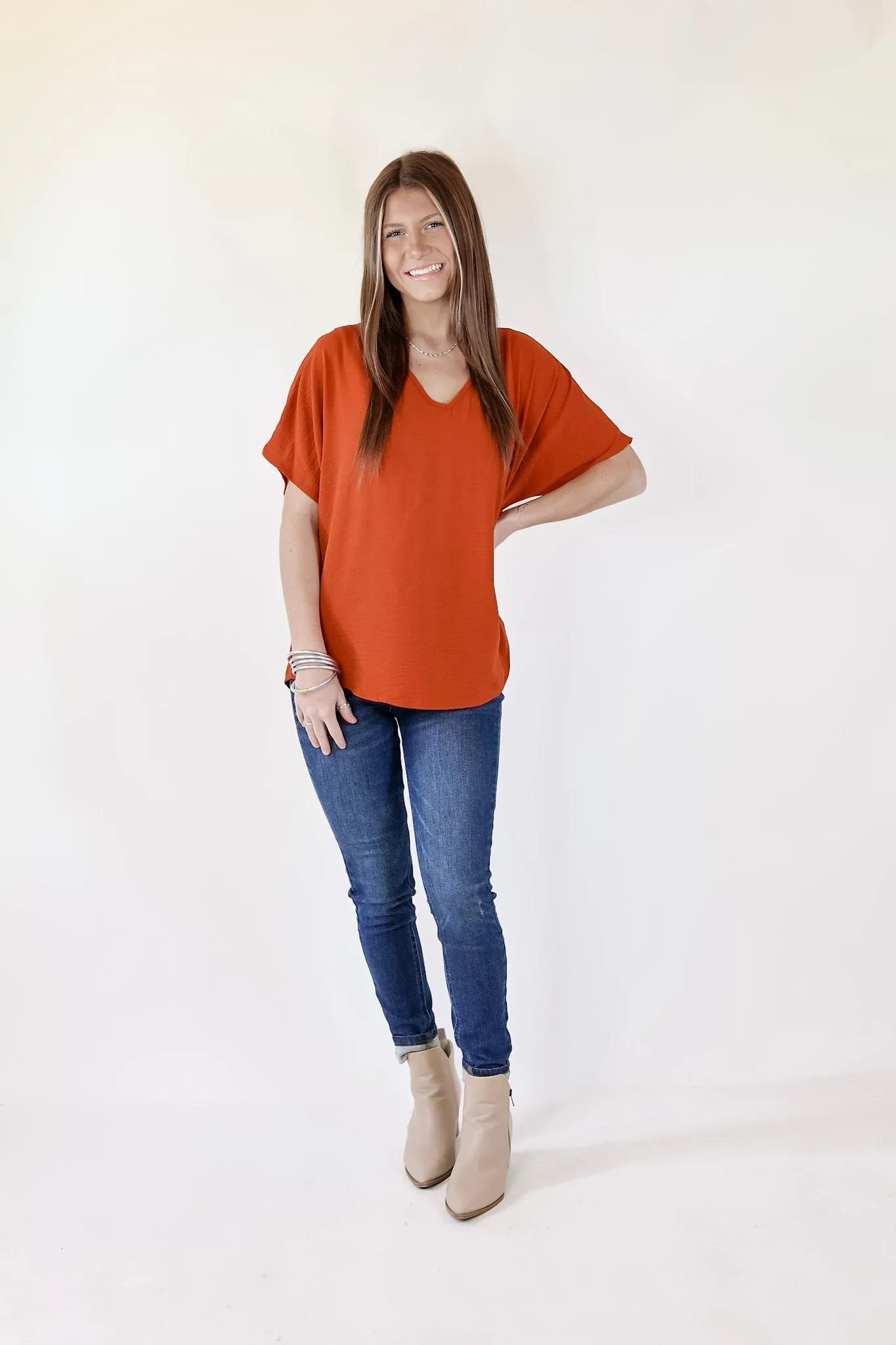 Lovely Dear V Neck Short Sleeve Solid Top in Rust Orange