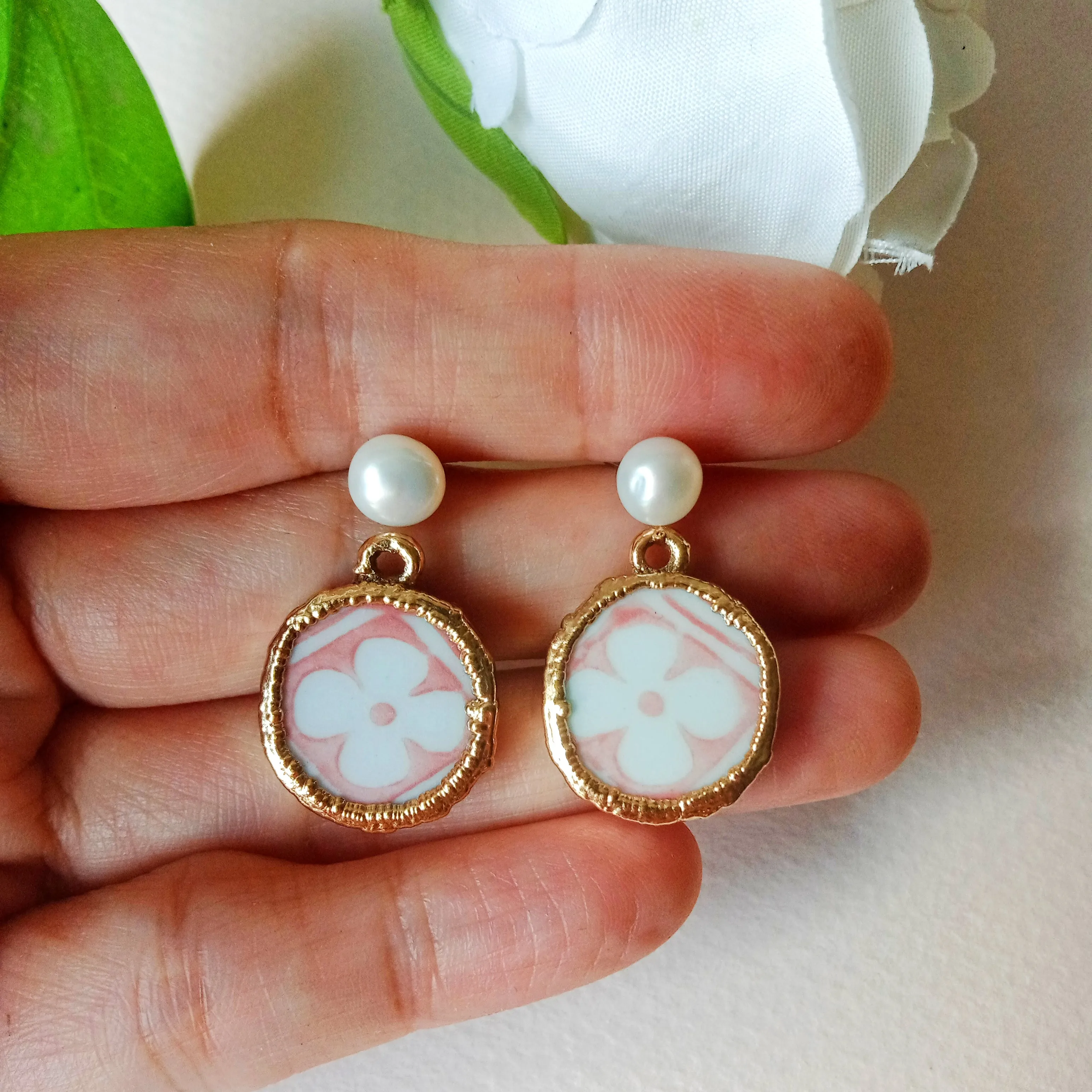 Petite pink stylized flower tile design porcelain earrings